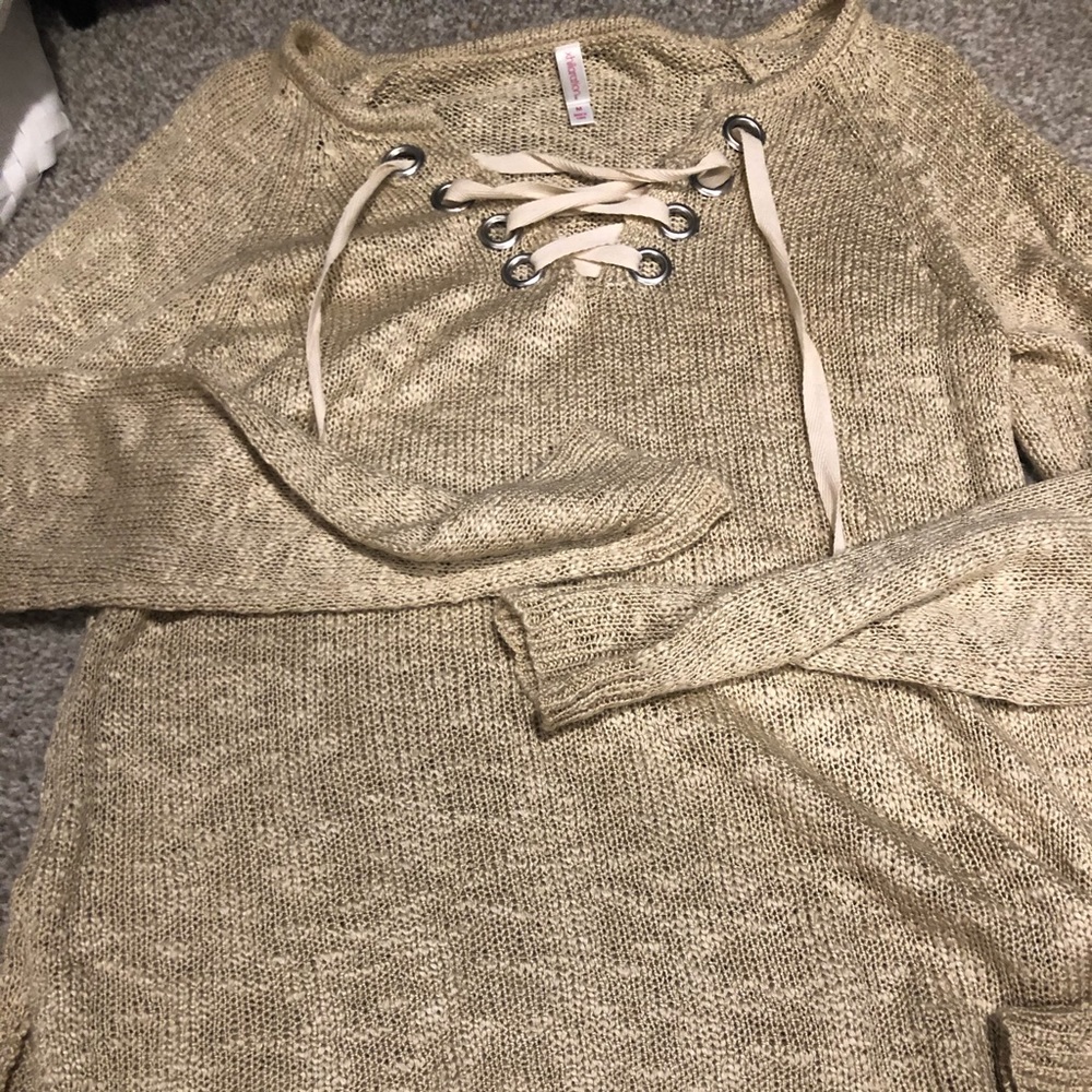 Cream colored tie sweater